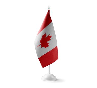 Small national flag of the Canada on a white background