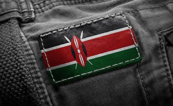Tag on dark clothing in the form of the flag of the Kenya