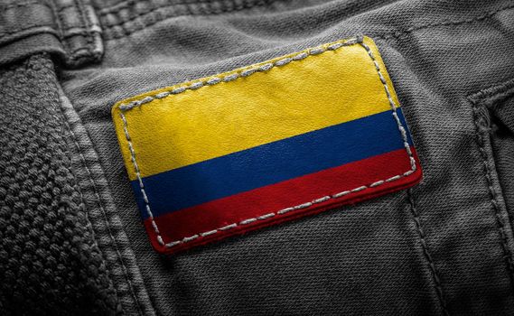Tag on dark clothing in the form of the flag of the Colombia