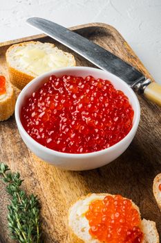 Canape with Red Salmon Caviar for New Year, on white background