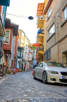 Authentic atmosphere of the old district in a Turkish city. Narrow street and old buildings