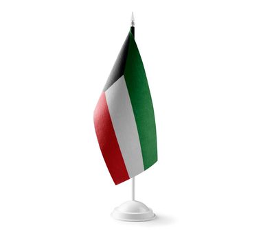 Small national flag of the Kuwait on a white background