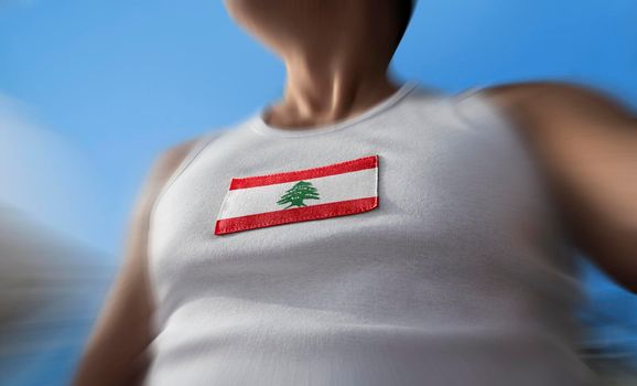 The national flag of Lebanon on the athlete's chest