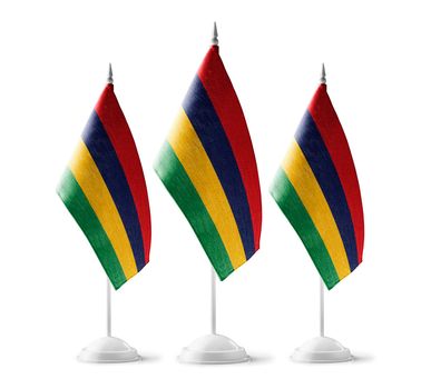 Small national flags of the Mauritius on a white background
