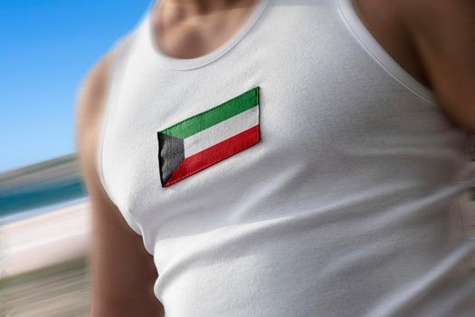 The national flag of Kuwait on the athlete's chest