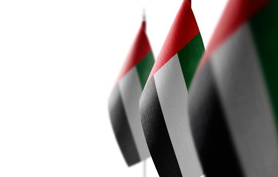 Small national flags of the United Arab Emirates on a white background