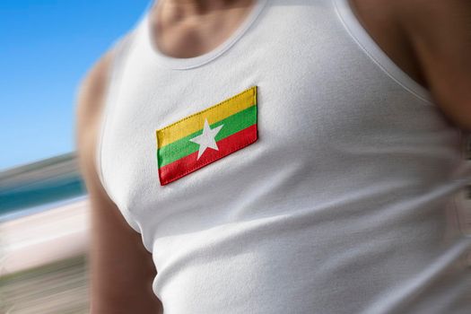 The national flag of Myanmar on the athlete's chest