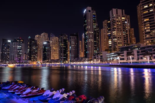 Dec 28, 2020 ,Dubai,UAE.Panoramic view of the beautifully illuminated sky scrappers, apartments and hotels captured from the marina mall ,Dubai, UAE.