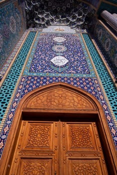 Feb 27th, 2021, Bur Dubai, UAE. View of the beautiful Iranian Mosque with intricate designs and wooden entrance door captured at Bur Dubai, UAE.