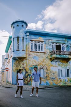 Curacao Willemstad Scharloo, Punda, Otrobanda, Pietermaai collorfull street art at the old bouldings in Willemstad, tourist by the old street art paintings