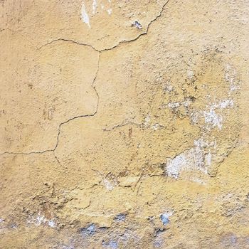 Old plaster wall with scratched background