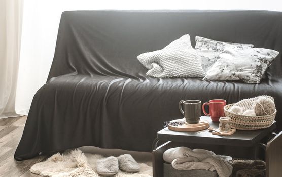 Cozy home interior living room with black sofa