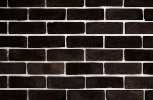 dark brown brick wall