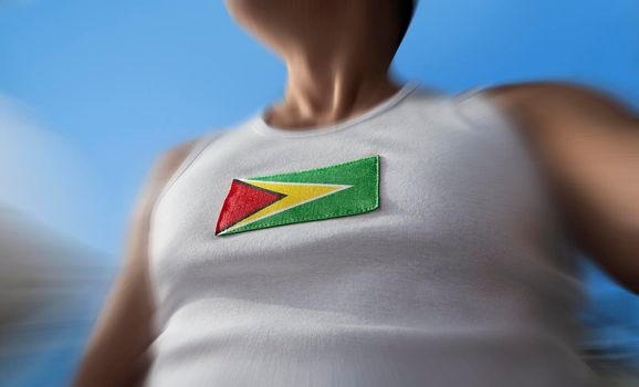 The national flag of Guyana on the athlete's chest