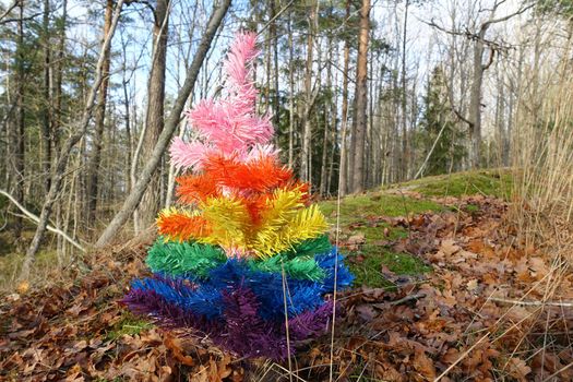 A symbolic Christmas tree with pride colors