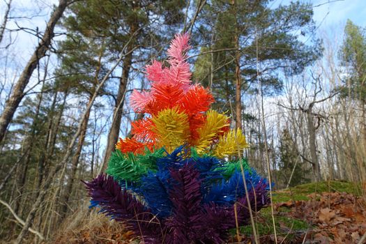 A symbolic Christmas tree with pride colors