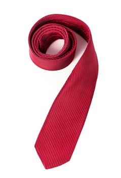 Red silk business tie rolled up over white background