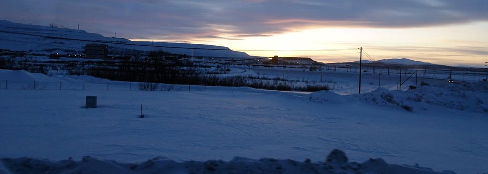 landscape in Sweden in winter during sunset