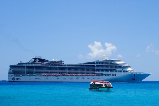 Cruise ship MSC Divina at sea with lifeguard