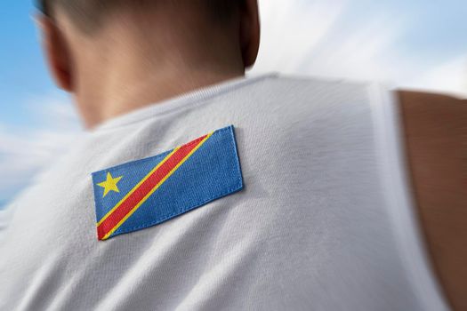 The national flag of Democratic Republic of the Congo on the athlete's back