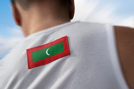 The national flag of Maldives on the athlete's back