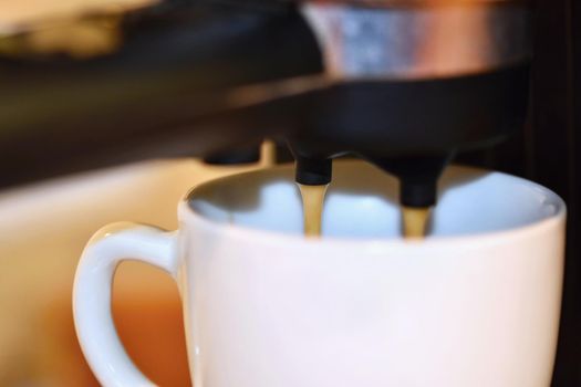 Espresso machine brewing a coffee.