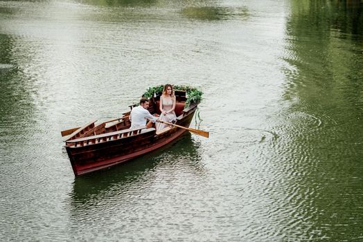 a boat trip for a guy and a girl along the canals and bays of the river