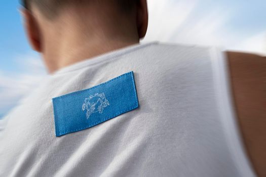 The national flag of Semeral Postal Union on the athlete's back