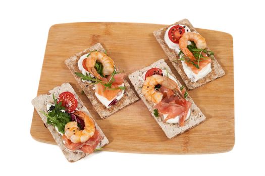  Delicious sandwiches with shrimp, salmon and tomatoes. 
