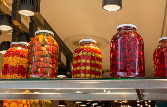 Homemade pickled fermented preserved vegetables in jars 