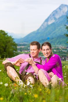 Couple with issues in Alpine meadow