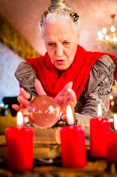 Soothsayer during esoteric session with Crystal ball