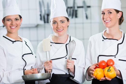 Female chefs in gastronomy business presenting products