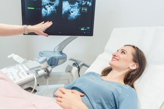 Woman at the gynecologist having ultrasonic examination