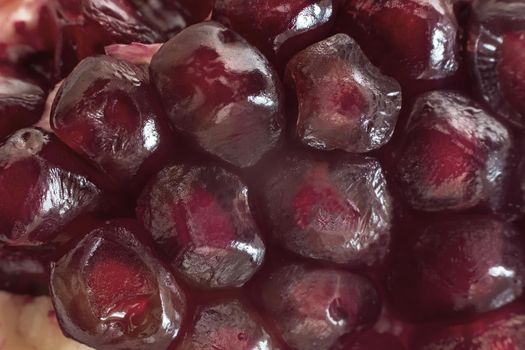 The fruits of pomegranate seeds with juicy pulp