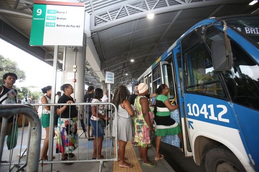 salvador, bahia / brazil - september 8, 2017: Passengers are seen while boarding buses at Mussurunga Station in Salvador.