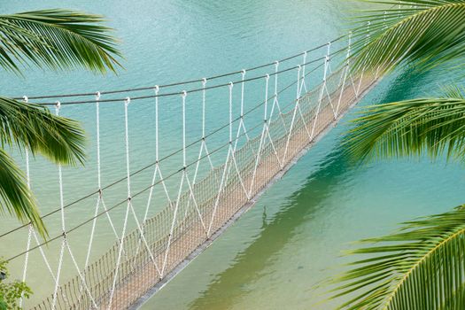scenic hanged bridge over sea water on the Sentosa island in Singapore