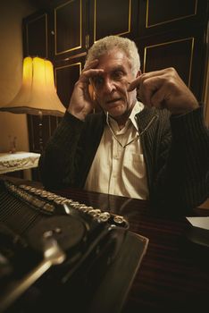 Pensive Retro Senior Man Writer