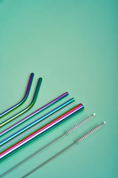 The modern trend in environmental care. Reusable metal straws for drinks. Replacement with common plastic beverage straws