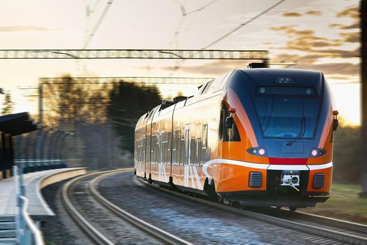 Express orange train. Estonian new train. Fast Light Intercity and Regional Train. ecological passenger transport
