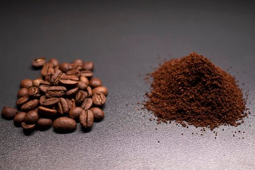 pile of ground or instant coffee and roasted coffee beans seeds. background 