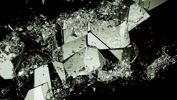 Pieces of broken or demolished glass on black