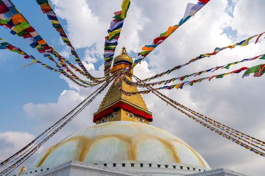 Boudhanath Stupa in Kathmandu and buddhist prayer flags