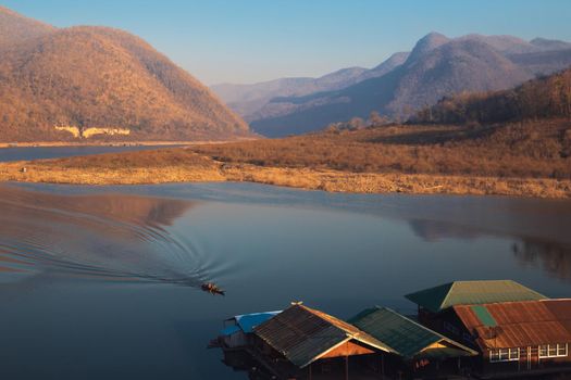 Kaeng Kor is big lake which surrounded by mountains with houseboats and restaurants.