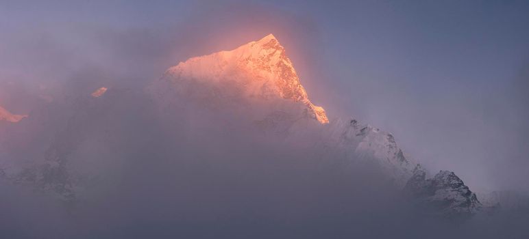 Nuptse and Everest summits at sunset or sunrise
