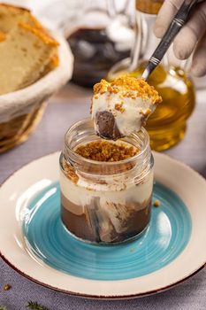 Layered mousse with crunchy crumbs topping