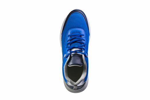 Blue sneaker made of fabric on a white background. Sport shoes.
