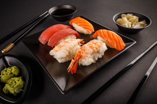Salmon, tuna and peawn sashimi sushi rolls
