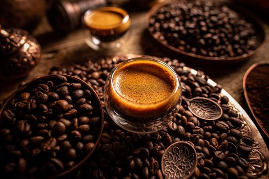 Espresso shot and coffee beans