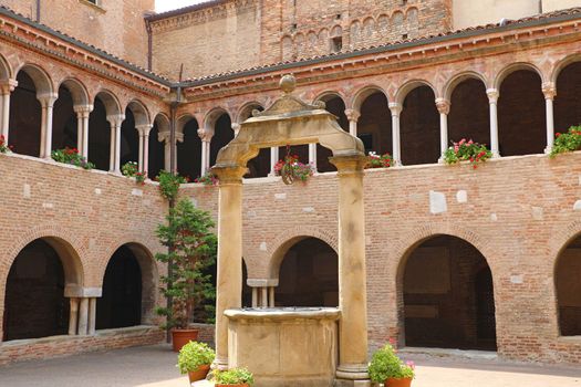 BOLOGNA, ITALY - JULY 22, 2019: cloisters in the inner courtyard of Santo Stefano church in Bologna, Italy